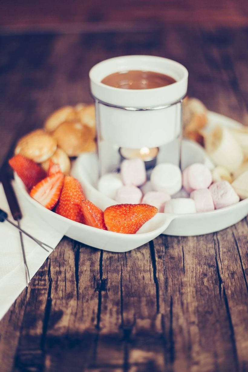 Chocolate fondue with strawberries and waffles