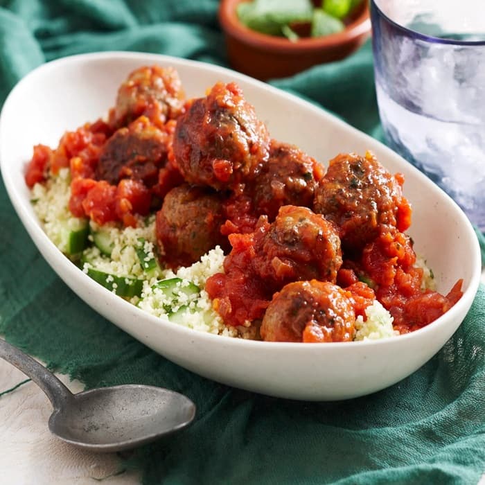 Small sharing plate of meatballs in tomato sauce